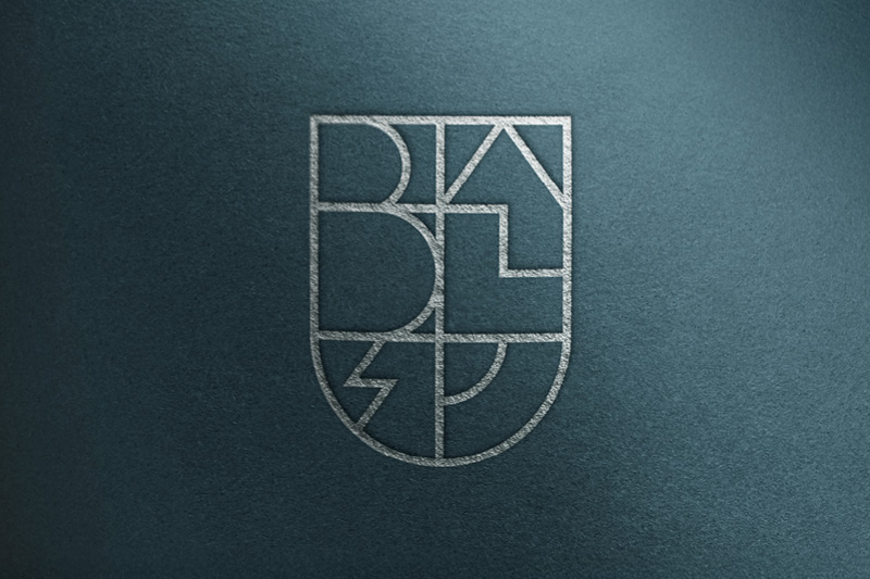 Balingen Logo Design Signet Atelier Türke Geprägtes Balingen Signet auf strukturierter Oberfläche, entwickelt von Atelier Türke für eine hochwertige und prägnante Markenidentität.