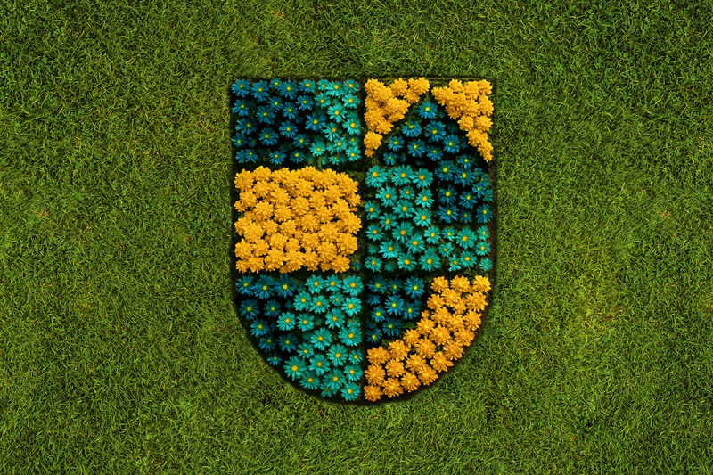 Balingen neues Design Bepflanzung Atelier Türke Balingen Signet als florale Installation aus Blumen auf Rasenfläche für eine kreative und natürliche Markeninszenierung. Neues Logodesign von Atelier Türke.